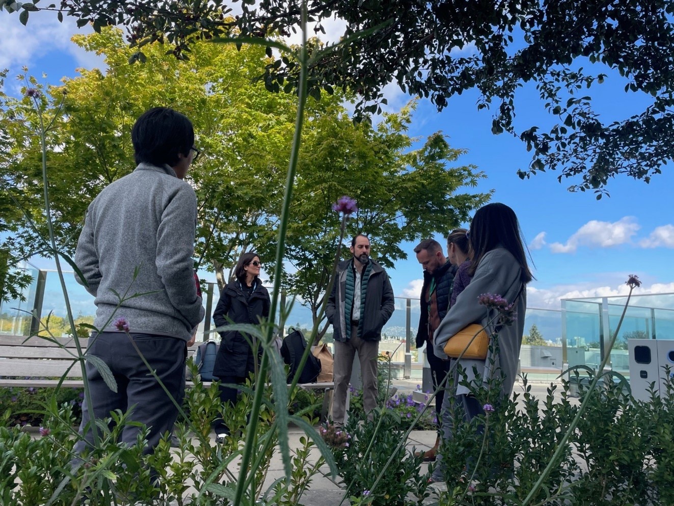 Dr. Dzung Vo, co-director of the BC Children’s Hospital Centre for Mindfulness, leads the Slocan Site Redevelopment Project team in a mindfulness walk on the rooftop garden of the Teck Acute Care Centre.